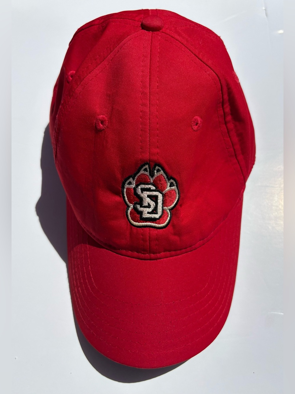 South Dakota Coyotes NCAA baseball cap by Adidas.